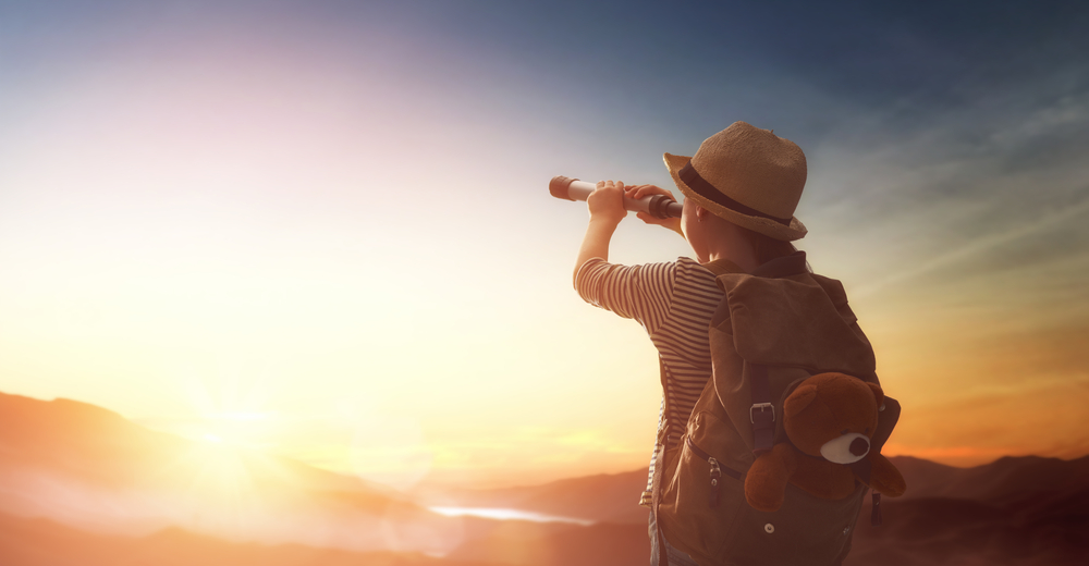 Little,Child,Is,Looking,At,Sunset.,Young,Traveller,With,Backpack.